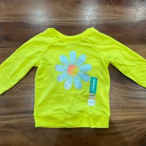 Bright yellow long sleeve daisy top